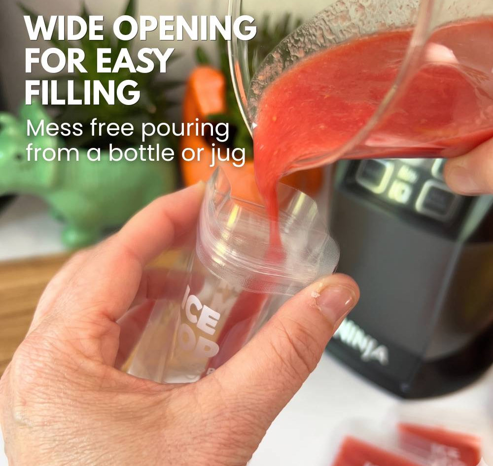 pouring blended fruits from a jug into a nom nom kids reusable ice pop bags