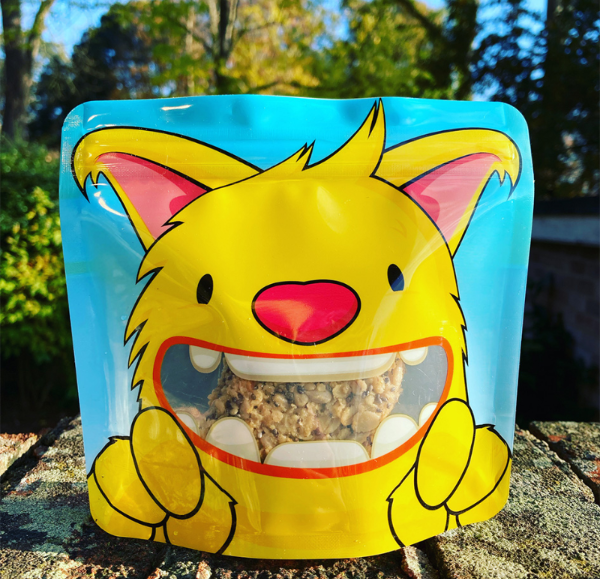 Nom Nom kids reusable snack pouch with flapjack inside