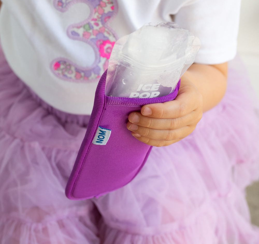 Purple Neoprene ice pop sleeve for a Nom Nom reusable ice pop bag to stop hands from getting col and keep the ice pop from melting so quick