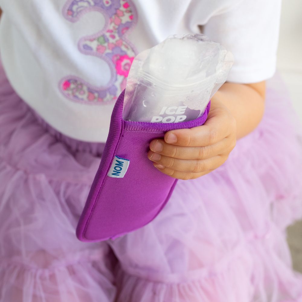 Purple Neoprene ice pop sleeve for a Nom Nom reusable ice pop bag to stop hands from getting col and keep the ice pop from melting so quick