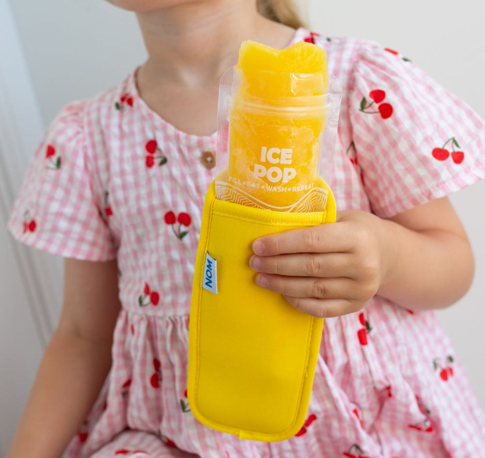 Yellow Neoprene ice pop sleeve for a Nom Nom reusable ice pop bag to stop hands from getting col and keep the ice pop from melting so quick