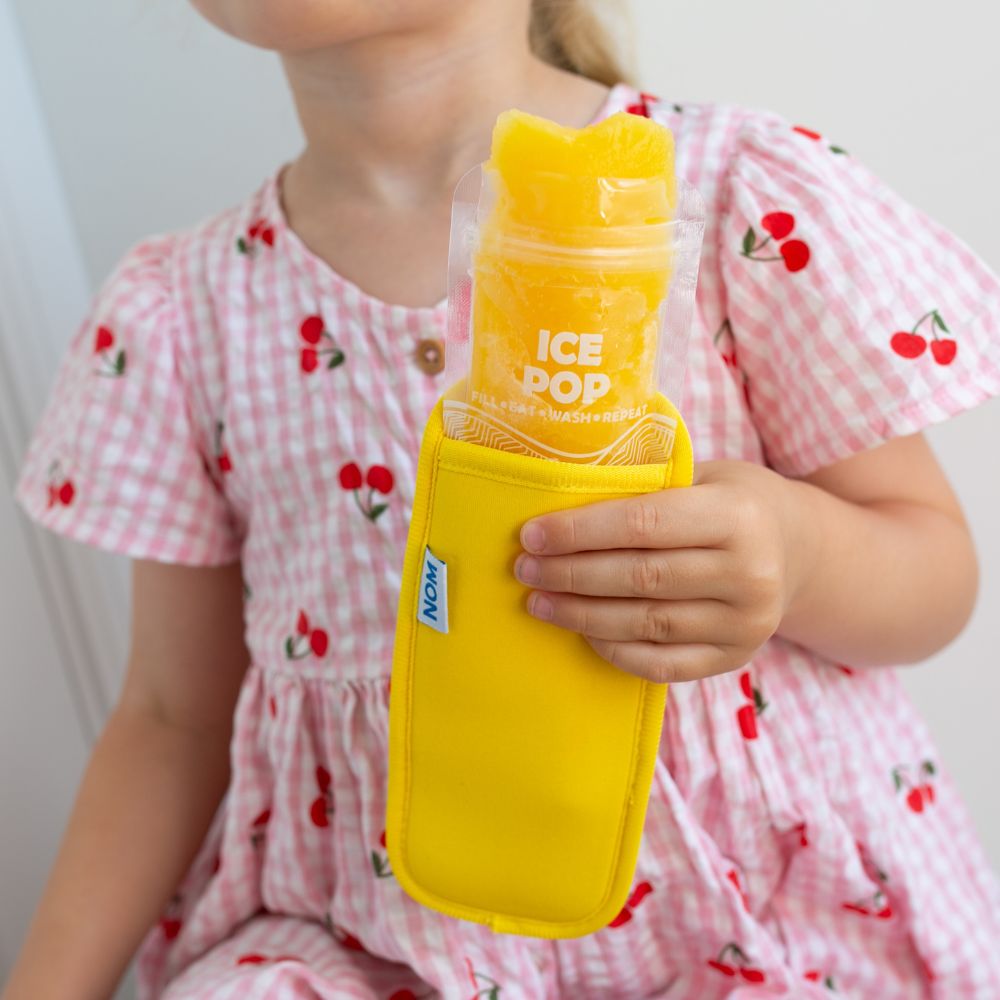 Yellow Neoprene ice pop sleeve for a Nom Nom reusable ice pop bag to stop hands from getting col and keep the ice pop from melting so quick