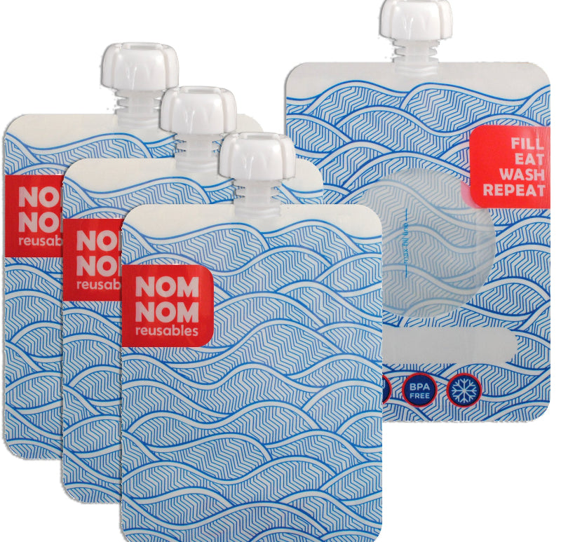 Set of four blue and white reusable pouches with 'NOM NOM reusables' branding on a white background.
