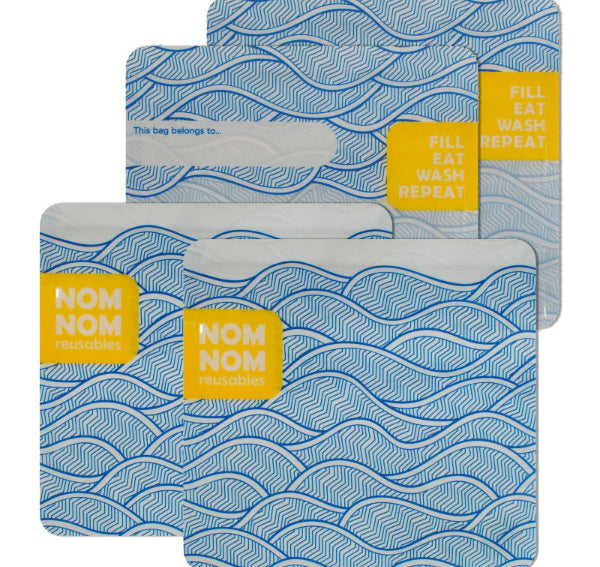 reusable snack bags with blue wave pattern and yellow 'Nom Nom' labels on a white background