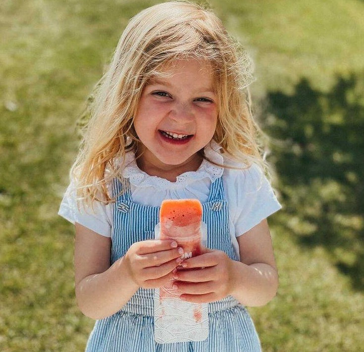 little girl with homemade ice pop