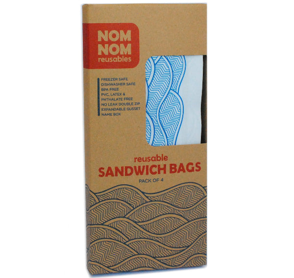 Pack of reusable sandwich bags with 'Nom Nom Reusables' branding on a cardboard box.