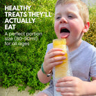 child eating a nom nom kids reusable ice pop 