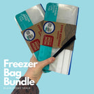 a hand holding 2 packs of Nom Nom Reusable Freezer bags and a pen