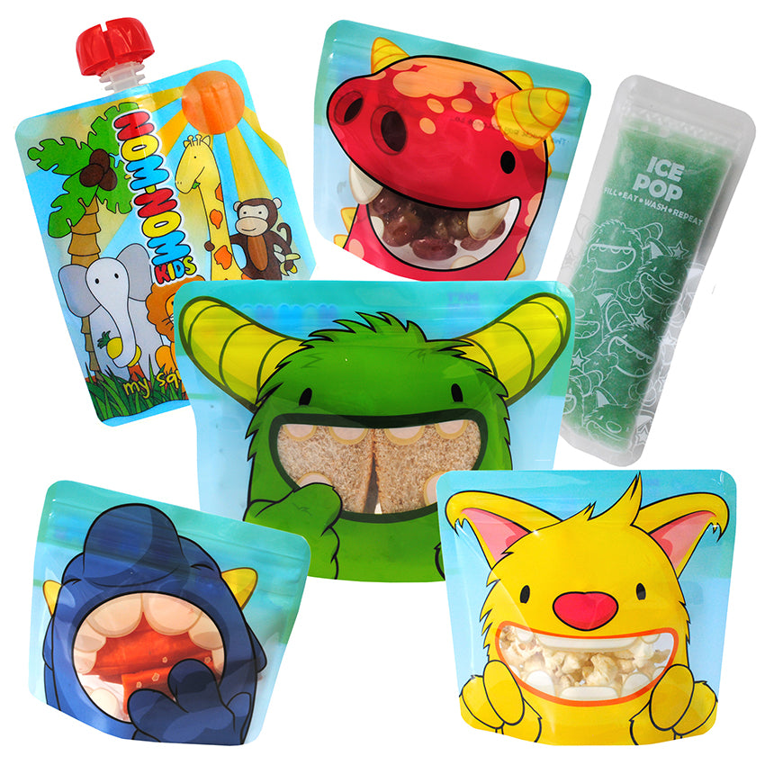 A collection of colourful reusable food pouches and snack bags with cartoon animal designs filled with sandwiches and healthy snacks 