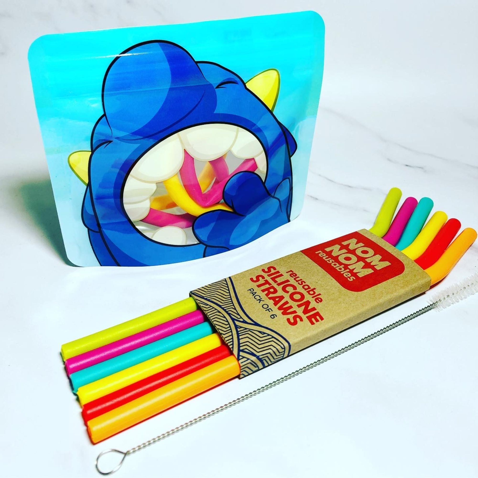 Nom Nom kids reusable rainbow silicone straws and snack pouches