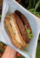 Nom Nom kids reusable sandwich bag with sandwich inside 