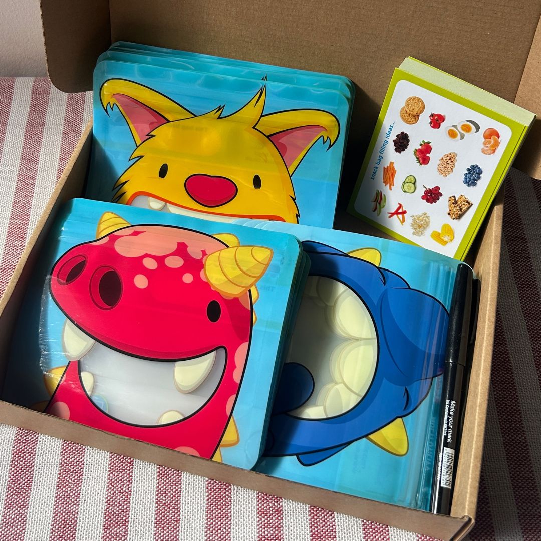 pack of reusable snack bags in cute monster designs