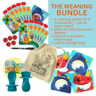 Weaning starter kit with pouches, silicone spoons, snack bags, and a pen, featuring colorful packaging.