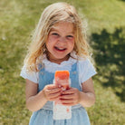 little girl with homemade ice pop 